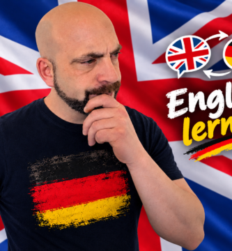 Noé Serrano reflexionando sobre cómo aprender inglés viviendo en Alemania con las banderas de Reino Unido y Alemania